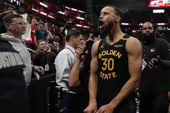 Golden State Warriors' Stephen Curry (30) celebrates after Game 7 of an NBA basketball first-round playoff series against the Houston Rockets Sunday, May 4, 2025, in Houston. (AP Photo/Ashley Landis)