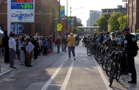 FILE - Protesters face off with Chicago police across the street from DePaul University in Chicago, May 16, 2024. (AP Photo/Teresa Crawford, file)