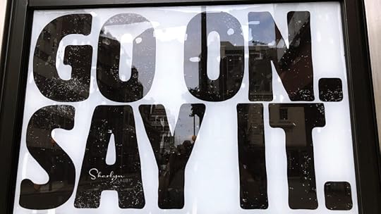 wall sign go on say it referring to listening styles