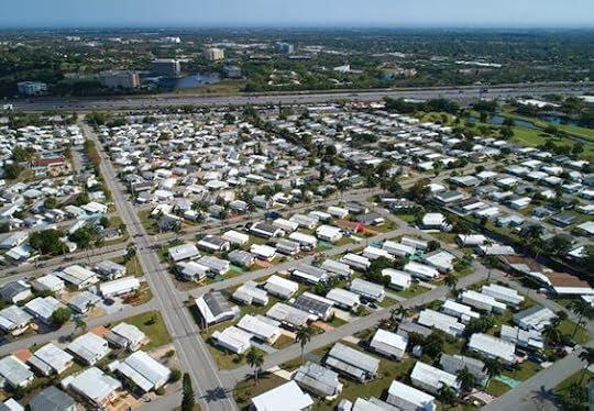 Aerial photo of a South Florida trailer park like the one in this novel about scam artists and a hurricane