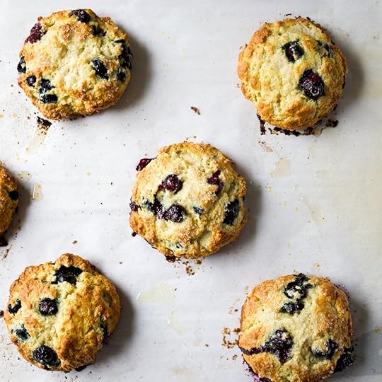 Fresh from the oven blueberry scones with golden brown edges and bursting with blueberries.