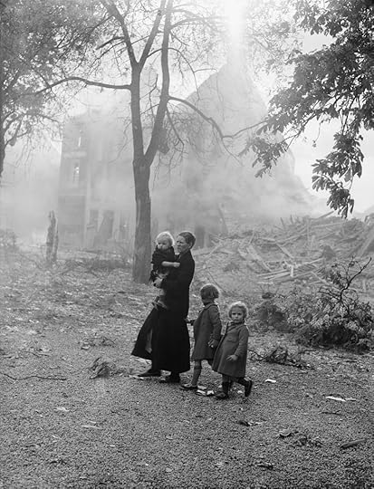 A family of refugees in devastated Enghien, Belgium, after the German invasion, May 1940 (Imperial War Museum: F 4499)