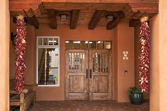 doors with hanging dried chiles at pinon court by la fonda in santa fe new mexico