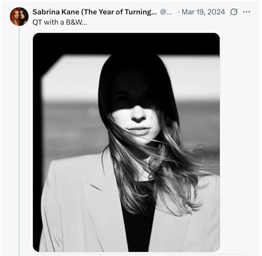 Social media post by Sabrina with a black and white photo of