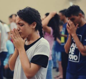 A young woman demonstrating intercession and sympathy