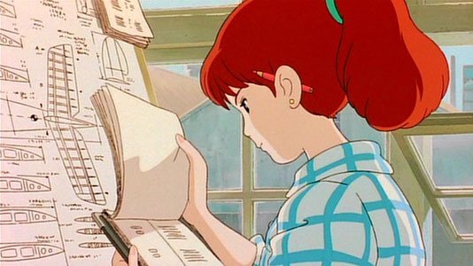 Fio looks over the schematics for the new plane, brows furrowed in concentration.