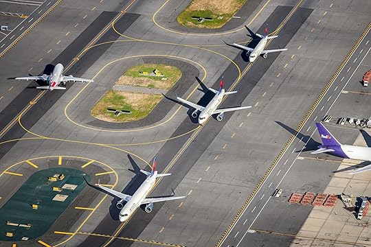 Aerial View Of Planes Taxiing At Boston Airport On A Sunny Bright Day