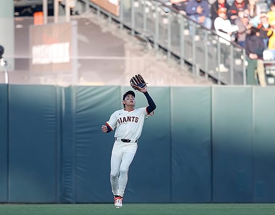 San Francisco Giants’ Jung Hoo Lee (51) makes a catch...