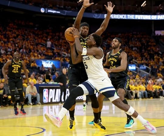 Minnesota Timberwolves' Anthony Edwards #5 drives to the basket past Golden State Warriors' Jimmy Butler III #10 in the third quarter of their NBA Western Conference semifinal game at the Chase Center in San Francisco, Calif., on Monday, May 12, 2025. (Jane Tyska/Bay Area News Group)
