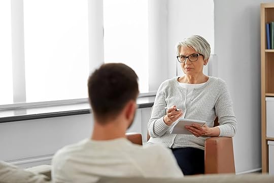 Image of a female therapist listening to a male client. By learning DBT in an adult intensive outpatient program in Houston, TX you can begin to manage and overcome your rejection sensitive dysphoria.