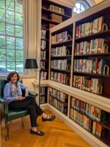 Author inside the Redwood Library