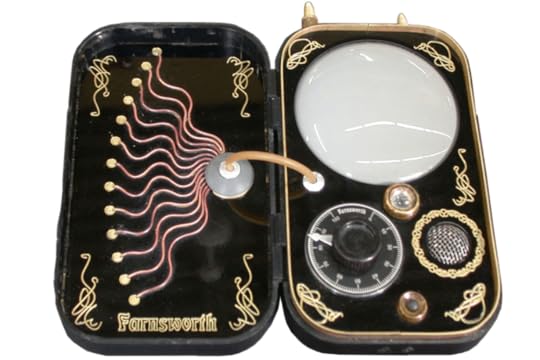 A device similar to a cell phone, but designed to look like it was made with much older technology.