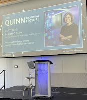 An empty podium with a screen on the background