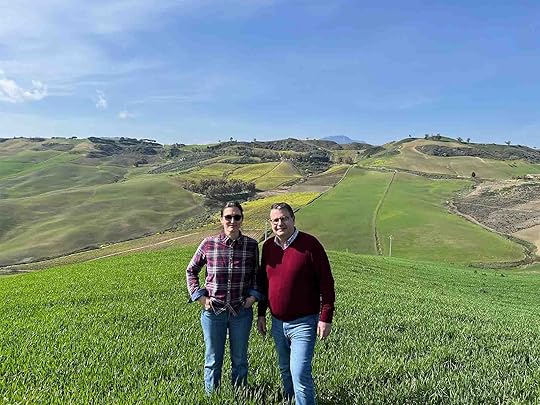 Melissa Muller and Fabio Sireci in a field of wheat at Feudo Montoni