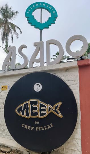 Nameboard before the restaurants Meen and Asado.