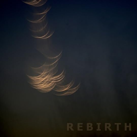 Cover art for Rebirth. It's mostly black, with multiple upside down thin crescents. Sort of looking at an elapse of an eclipse.