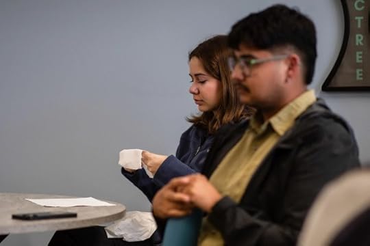 Student Marisa Mendoza gets emotional while she speaks about her research at Cal State San Marcos on May 6, 2025. (Adriana Heldiz - CalMatters)