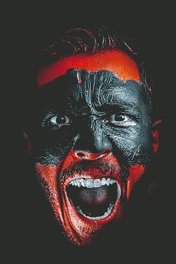 person with red and black face paint