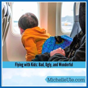 Flying with kids looking out a window
