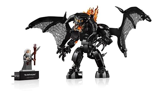 The LEGO Ideas Lord of the Rings Balrog next to Gandalf Minifigure.