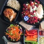 meal prep boxes featuring rotisserie chicken.