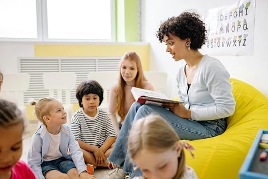 woman good with kids, reading to a group