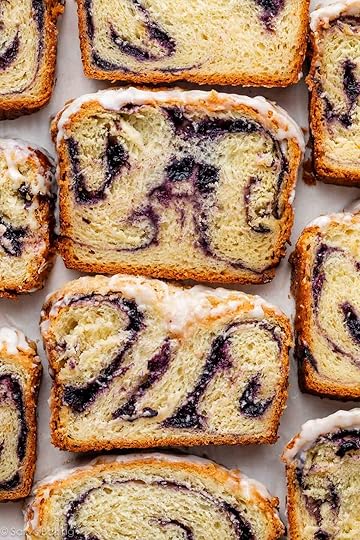 slices of lemon blueberry babka with icing.