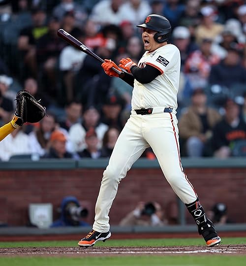 San Francisco Giants’ Wilmer Flores #41 is hit by a...