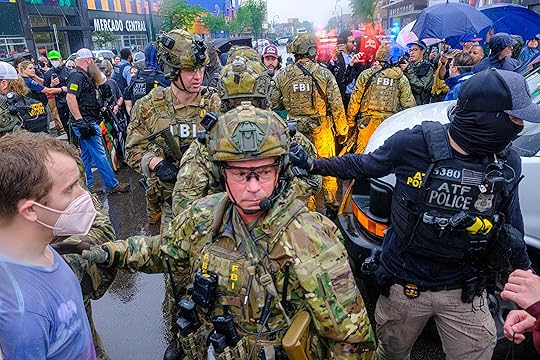 ICE, ATF, and FBI officers are seen as tensions escalate...