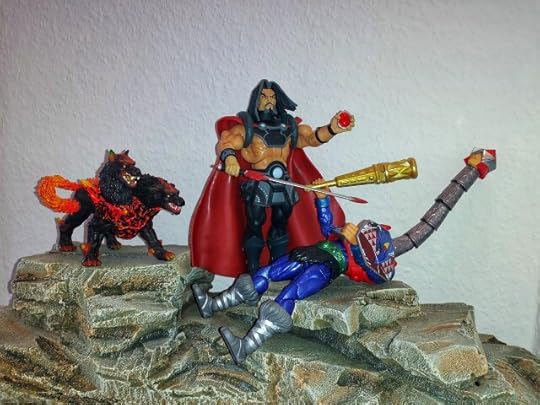 Mekaneck is down and has extended his neck, while Marzo threatens him with his sword. 