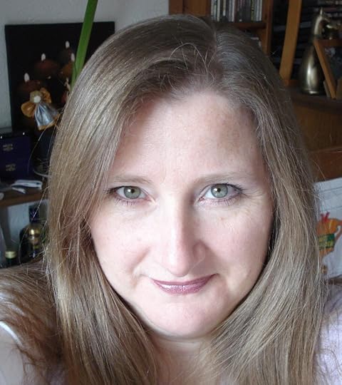 Selfie of a white woman, blonde hair and blue eyes.