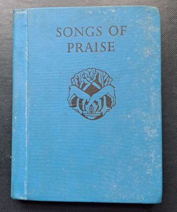 Cover of the Songs of Praise hymnbook