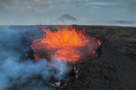 Volcano eruption at Fagradalsfjall next to Litli-Hrútur in Iceland in 2023 captured from up close with a drone. Such a shot was only made possible by the use of new technologies, since it is otherwise impossible to safely observe an erupting volcano at such close range. The picture was also captured with Keilir perfectly aligned in the background. The extreme temperature of the lava creates a heat haze that can be seen on the left side of the image, beeing carried by the wind.