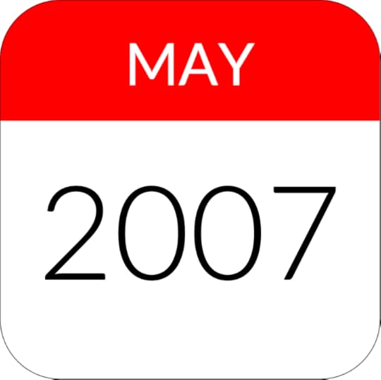 Een rode sticker met het woord 'MAY' in witte letters.