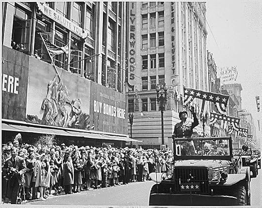 Gen. George Patton acknowledging the cheers of the welcoming crowds in Los Angeles, California, 9 Jun 1945 (US National Archives: ARC 535941)