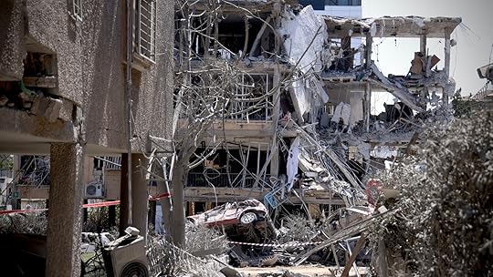 The aftermath of a damaged residential building after a ballistic missile strike in Ramat Gan, near Tel Aviv, on 14 June 2025 (MEE/Faiz Abu Rmeleh)