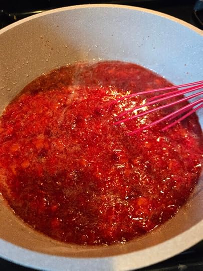 Strawberry jam in a pot.