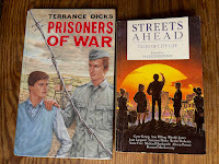 Cover of Prisoners of War by Terrance Dicks, showing German soldier with his hand on the shoulder of a boy behind barbed wire, and Streets Ahead anthology with children in front of a sunset