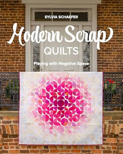 A book cover featuring a pink and white quilt draped over a railing. The title is 