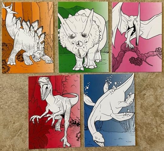 Five baseball card sized dinosaur trading cards. The dinosaurs and black and white while the backgrounds are one colour. The Stegosaurus is orange, the triceratops is green, the pteradcyl is purple, the raptor is red, and the Plesiosaurus is blue.