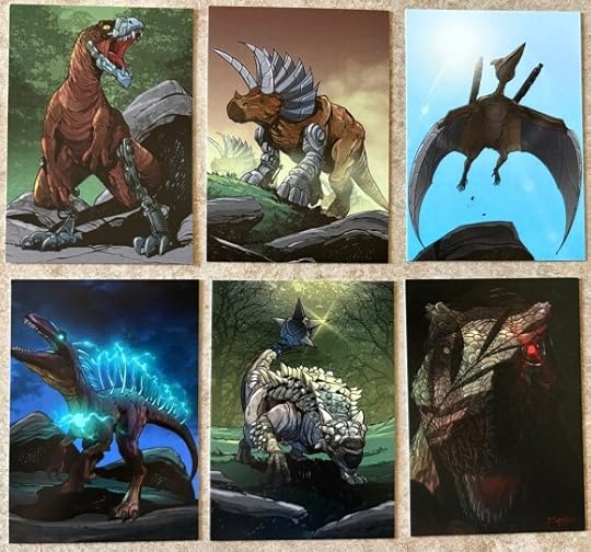 Six trading cards. The first is a carnivorous dinosaur (not sure what species) that has robot legs and a metal nose and jaw. Next is a triceratops with front legs that are robotic and horns that are too. Next is a flying pterodactyl that has two cannons protruding from it. On row two there is a dinosaur with electric spines coming from its back. Next to that is an Ankylosaurus with a metal spiked mace for a tail tip, and finally there is a close up of a T-rex face with one of its eyes beaming red.
