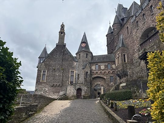 Entrance with clocktower leading into Cochem Castle.