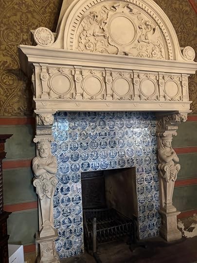 Mosaic Tiles around fireplace in Cochem Castle.