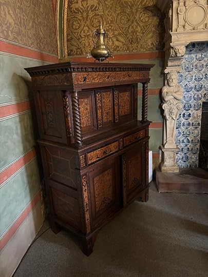 An older furniture piece displayed in the museum that is Cochem Castle.