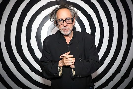 image of tim burton infront of a black and white bullseye