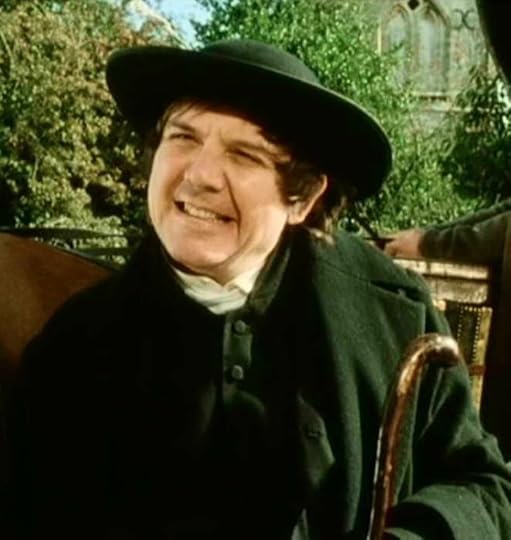 David Bamber, actor, as Mr Collins in the 1995 BBC version; he is grinning stupidly.