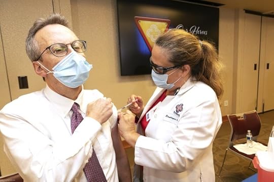 Salinas Valley Health President and CEO, Dr. Allen Radner, receives the first COVID-19 vaccine shot in Monterey County in Dec., 2020. At the time, he was the Chief Medical Officer and infectious disease physician at the healthcare facility. (Photo courtesy of Salinas Valley Health)