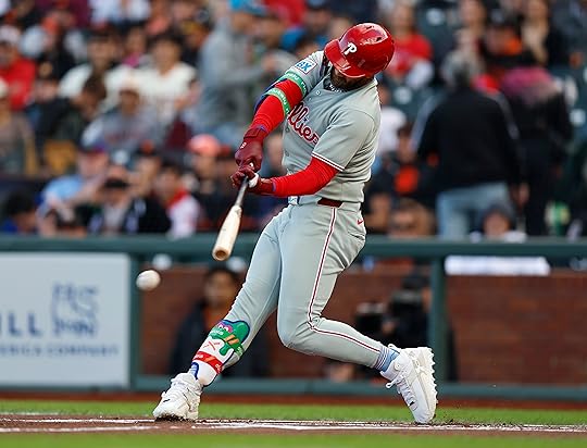 Philadelphia Phillies’ Bryce Harper (3) hits a single against the...