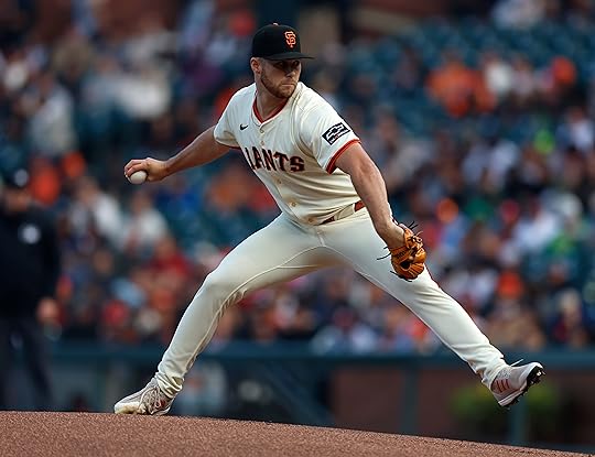 San Francisco Giants starting pitcher Landen Roupp (65) throws against...