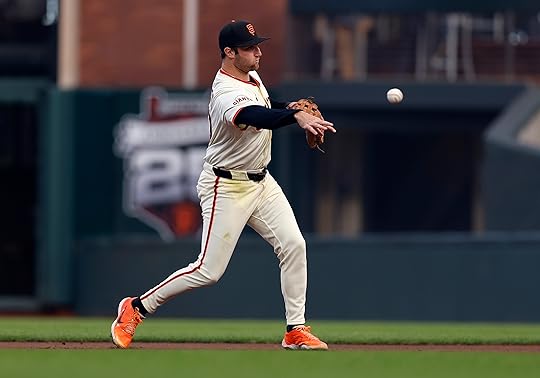San Francisco Giants’ Casey Schmitt (10) throws to first base...